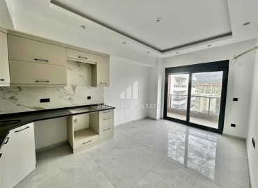 Трехкомнатные апартаменты с видом на море и горы, 68м², в малоквартирном комплексе в районе Алании - Оба ID-18986 фото-3