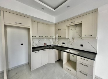 Трехкомнатные апартаменты с видом на море и горы, 68м², в малоквартирном комплексе в районе Алании - Оба ID-18986 фото-4