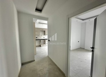 Трехкомнатные апартаменты с видом на море и горы, 68м², в малоквартирном комплексе в районе Алании - Оба ID-18986 фото-5