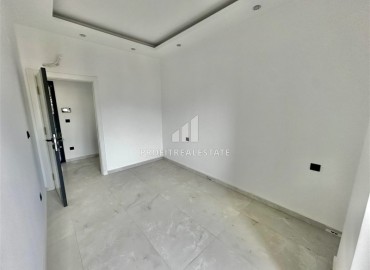 Трехкомнатные апартаменты с видом на море и горы, 68м², в малоквартирном комплексе в районе Алании - Оба ID-18986 фото-8