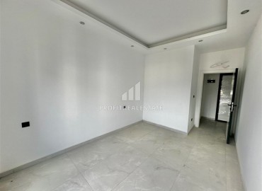 Трехкомнатные апартаменты с видом на море и горы, 68м², в малоквартирном комплексе в районе Алании - Оба ID-18986 фото-10