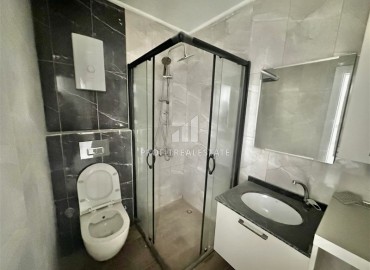 Трехкомнатные апартаменты с видом на море и горы, 68м², в малоквартирном комплексе в районе Алании - Оба ID-18986 фото-11