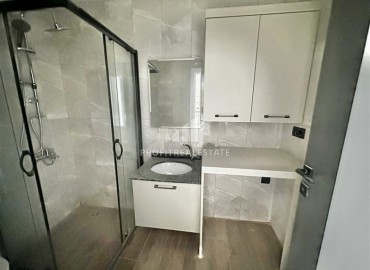 Трехкомнатные апартаменты с видом на море и горы, 68м², в малоквартирном комплексе в районе Алании - Оба ID-18986 фото-12