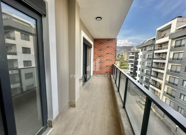 Трехкомнатные апартаменты с видом на море и горы, 68м², в малоквартирном комплексе в районе Алании - Оба ID-18986 фото-13