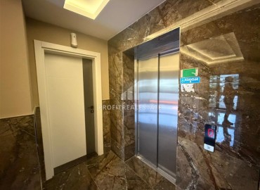 Трехкомнатные апартаменты с видом на море и горы, 68м², в малоквартирном комплексе в районе Алании - Оба ID-18986 фото-20