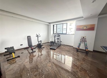 Трехкомнатные апартаменты с видом на море и горы, 68м², в малоквартирном комплексе в районе Алании - Оба ID-18986 фото-21