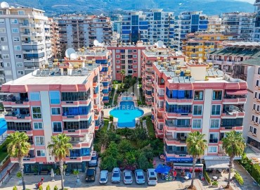 Большая квартира 2+1, 120м², после ремонта в уютном комплексе на первой береговой линии в Махмутларе, Алания ID-18987 фото-1