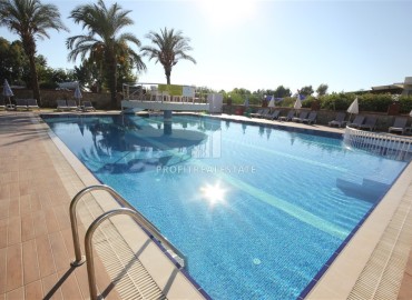 Трехкомнатная видовая квартира, 110м², в уютном комплексе в 100м от моря в районе Алании Демирташ ID-18989 фото-20