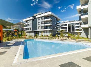 Новые четырехкомнатные апартаменты с отдельной кухней, 150м², в резиденции премиум класса, в районе Оба, Алания ID-18994 фото-1