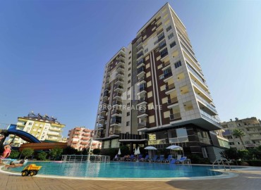 Укомплектованная квартира 1+1, 75м², в элитной резиденции в 150м от моря в районе Махмутлар, Алания ID-18999 фото-1