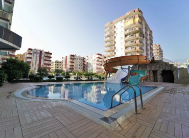 Укомплектованная квартира 1+1, 75м², в элитной резиденции в 150м от моря в районе Махмутлар, Алания ID-18999 фото-27