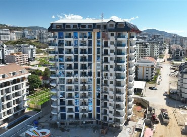 Двухкомнатные апартаменты, 51,3м², в элитном комплексе на этапе строительства, в Махмутларе, Алания ID-17654 фото-1