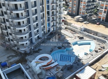 Двухкомнатные апартаменты, 51,3м², в элитном комплексе на этапе строительства, в Махмутларе, Алания ID-17654 фото-3