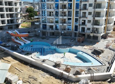 Двухкомнатные апартаменты, 51,3м², в элитном комплексе на этапе строительства, в Махмутларе, Алания ID-17654 фото-4