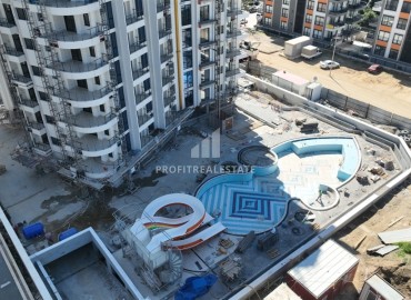 Двухкомнатные апартаменты, 51,3м², в элитном комплексе на этапе строительства, в Махмутларе, Алания ID-17654 фото-5