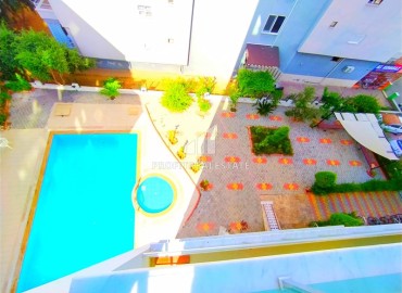 Меблированная квартира 1+1, 60м², в комплексе с бассейном от собственника в районе Махмутлар, Алания ID-19002 фото-15