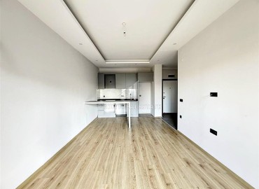 Выгодное предложение: новая квартира с одной спальней, 50м², в новостройке премиум класса в Авсалларе, Алания ID-19006 фото-2