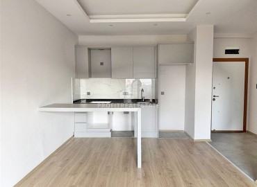 Выгодное предложение: новая квартира с одной спальней, 50м², в новостройке премиум класса в Авсалларе, Алания ID-19006 фото-3