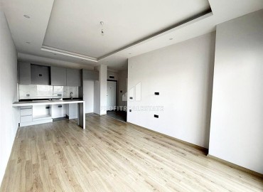 Выгодное предложение: новая квартира с одной спальней, 50м², в новостройке премиум класса в Авсалларе, Алания ID-19006 фото-4