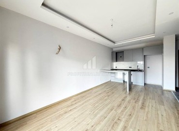 Выгодное предложение: новая квартира с одной спальней, 50м², в новостройке премиум класса в Авсалларе, Алания ID-19006 фото-5