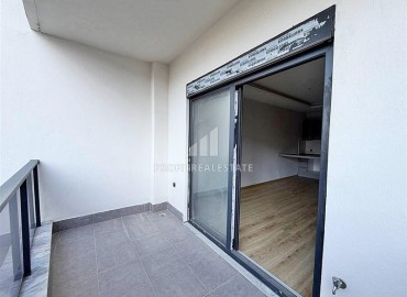 Выгодное предложение: новая квартира с одной спальней, 50м², в новостройке премиум класса в Авсалларе, Алания ID-19006 фото-15