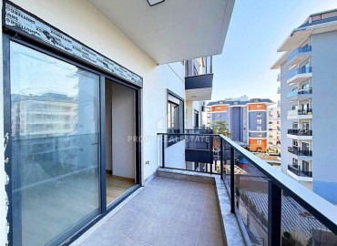 Выгодное предложение: новая квартира с одной спальней, 50м², в новостройке премиум класса в Авсалларе, Алания ID-19006 фото-16