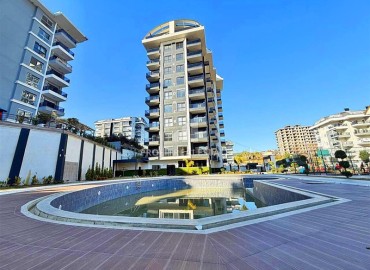 Выгодное предложение: новая квартира с одной спальней, 50м², в новостройке премиум класса в Авсалларе, Алания ID-19006 фото-18