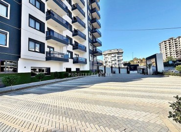 Выгодное предложение: новая квартира с одной спальней, 50м², в новостройке премиум класса в Авсалларе, Алания ID-19006 фото-28