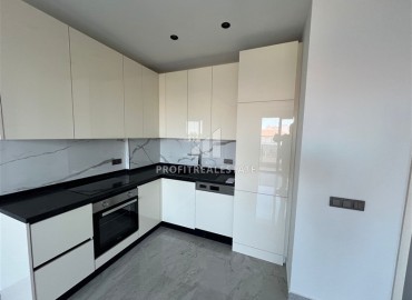 Двухкомнатная квартира, 53м², с чистовой отделкой в комфортабельной новостройке в центре Алании, в 300м от моря ID-19010 фото-1