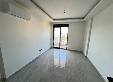 Двухкомнатная квартира, 53м², с чистовой отделкой в комфортабельной новостройке в центре Алании, в 300м от моря ID-19010 фото-3