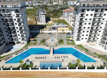 Квартира с одной спальней, 55м², с чистовой отделкой в новой резиденции премиум класса в районе Паяллар, Алания ID-19011 фото-1