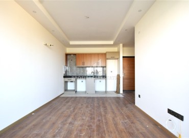 Квартира с одной спальней, 55м², с чистовой отделкой в новой резиденции премиум класса в районе Паяллар, Алания ID-19011 фото-2