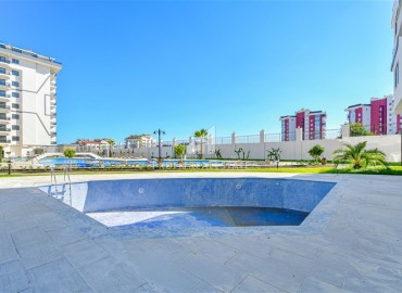 Квартира с одной спальней, 55м², с чистовой отделкой в новой резиденции премиум класса в районе Паяллар, Алания ID-19011 фото-14