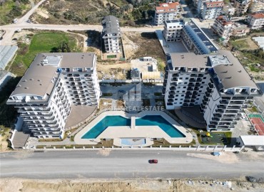 Квартира с одной спальней, 55м², с чистовой отделкой в новой резиденции премиум класса в районе Паяллар, Алания ID-19011 фото-36