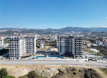 Квартира с одной спальней, 55м², с чистовой отделкой в новой резиденции премиум класса в районе Паяллар, Алания ID-19011 фото-37