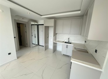 Видовые апартаменты 1+1, 47м² в элегантной резиденции с инфраструктурой на первой береговой линии в районе Кестель, Алания ID-19012 фото-3