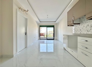 Двухкомнатная квартира, 50м², с чистовой отделкой в новом комплексе с зимним бассейном в районе Каракоджалы, Оба, Алания ID-19013 фото-4