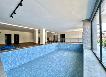 Двухкомнатная квартира, 50м², с чистовой отделкой в новом комплексе с зимним бассейном в районе Каракоджалы, Оба, Алания ID-19013 фото-12