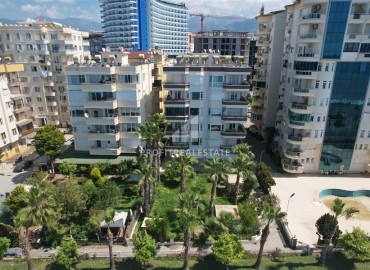 Элитная двухкомнатная квартира, 95м², на первой береговой линии с видом на Аланийскую крепость в районе Тосмур, Алания ID-19019 фото-1