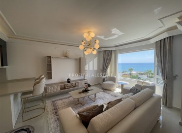 Элитная двухкомнатная квартира, 95м², на первой береговой линии с видом на Аланийскую крепость в районе Тосмур, Алания ID-19019 фото-3