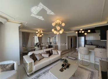 Элитная двухкомнатная квартира, 95м², на первой береговой линии с видом на Аланийскую крепость в районе Тосмур, Алания ID-19019 фото-5