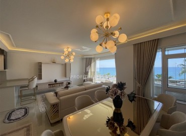 Элитная двухкомнатная квартира, 95м², на первой береговой линии с видом на Аланийскую крепость в районе Тосмур, Алания ID-19019 фото-7