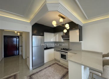 Элитная двухкомнатная квартира, 95м², на первой береговой линии с видом на Аланийскую крепость в районе Тосмур, Алания ID-19019 фото-8