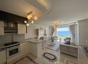 Элитная двухкомнатная квартира, 95м², на первой береговой линии с видом на Аланийскую крепость в районе Тосмур, Алания ID-19019 фото-9