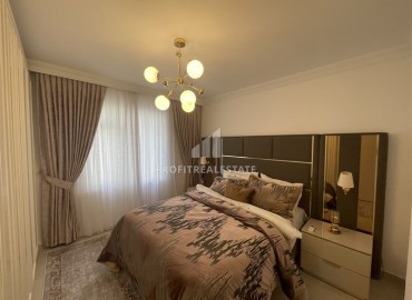 Элитная двухкомнатная квартира, 95м², на первой береговой линии с видом на Аланийскую крепость в районе Тосмур, Алания ID-19019 фото-12