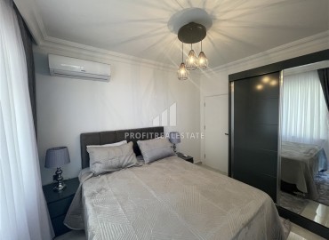 Элитная двухкомнатная квартира, 95м², на первой береговой линии с видом на Аланийскую крепость в районе Тосмур, Алания ID-19019 фото-14