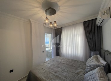 Элитная двухкомнатная квартира, 95м², на первой береговой линии с видом на Аланийскую крепость в районе Тосмур, Алания ID-19019 фото-16