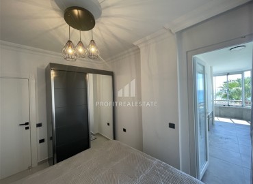 Элитная двухкомнатная квартира, 95м², на первой береговой линии с видом на Аланийскую крепость в районе Тосмур, Алания ID-19019 фото-17