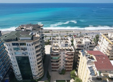 Элитная двухкомнатная квартира, 95м², на первой береговой линии с видом на Аланийскую крепость в районе Тосмур, Алания ID-19019 фото-24