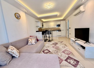 Укомплектованные апартаменты 1+1, 66м², в элитной резиденции в 300м от моря в районе Махмутлар, Алания ID-19024 фото-2